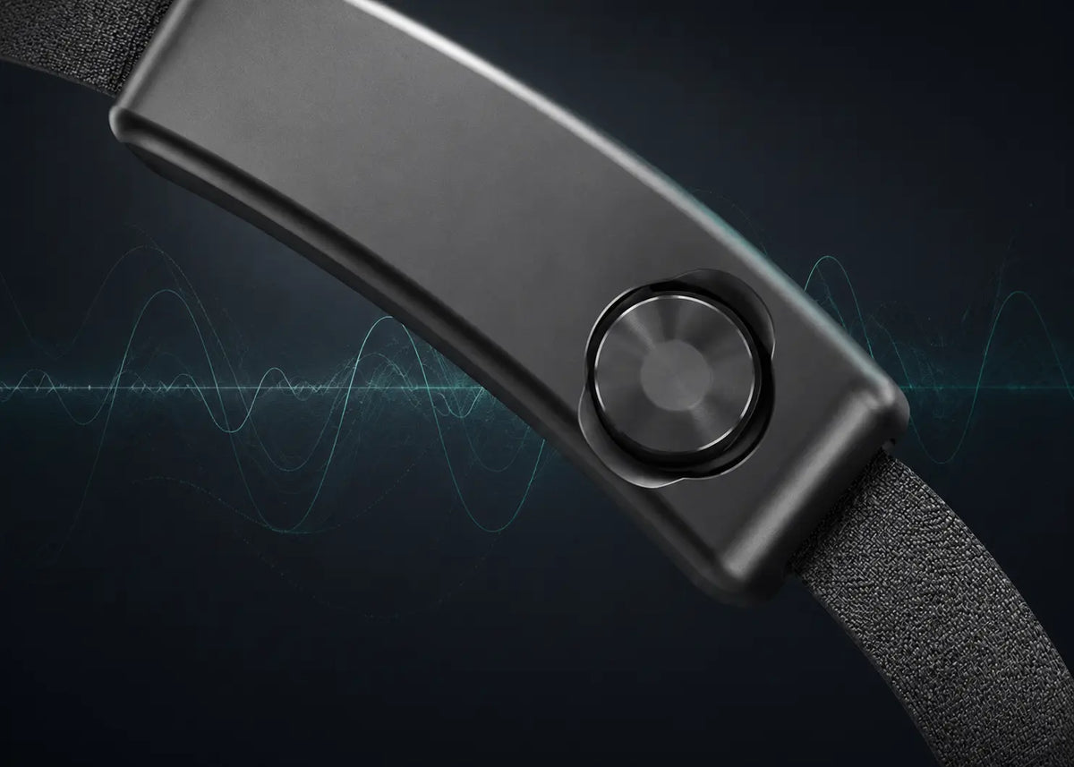 Close-up of the SereniBrain EEG sensor with a subtle EEG waveform